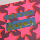 Welsh Birthday Card, Penblwydd Hapus, Dark Pink Stars, text foiled in shiny gold