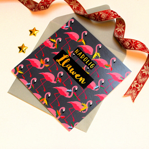 Welsh Christmas Card, Flamingoes and Holly, text foiled in shiny gold