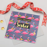 Christmas Card, Sister Flamingoes and Holly, text foiled in shiny gold